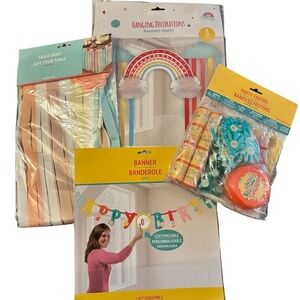 Vibrant Orange and Yellow Party Decorations with Balloon Arches